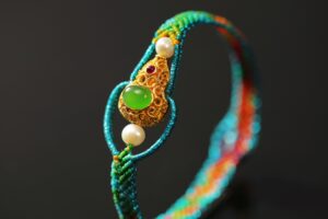 green thread and gold inlay