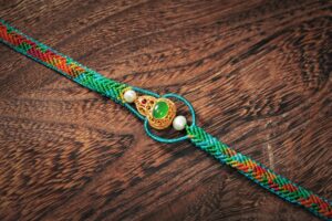 green thread and gold inlay