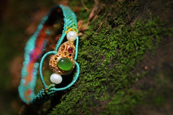 green thread and gold inlay