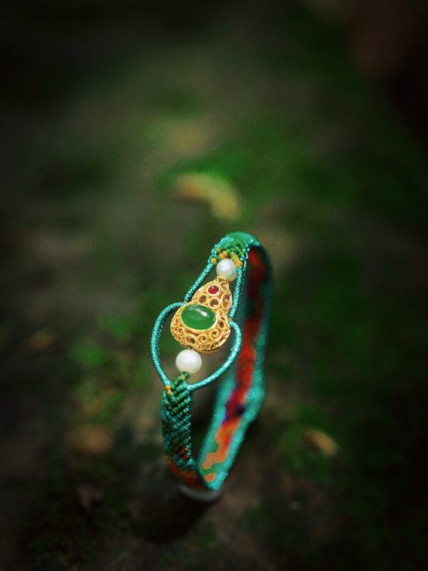 green thread and gold inlay
