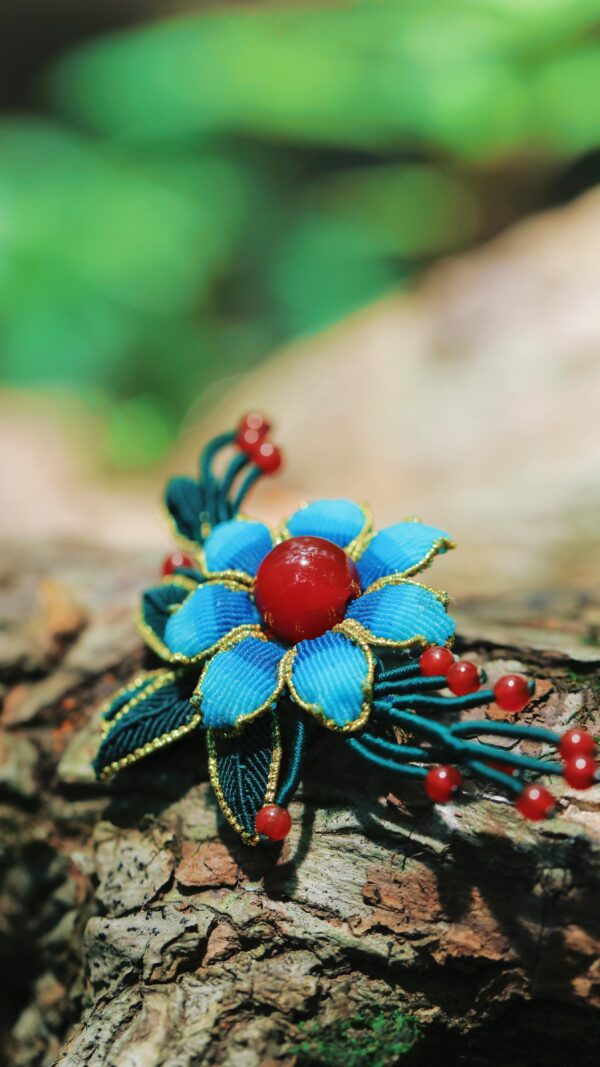 blue and gold inlaid red pearl flower decoration
