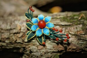 blue and gold inlaid red pearl flower decoration